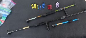 image of 2 blow darts with accessories